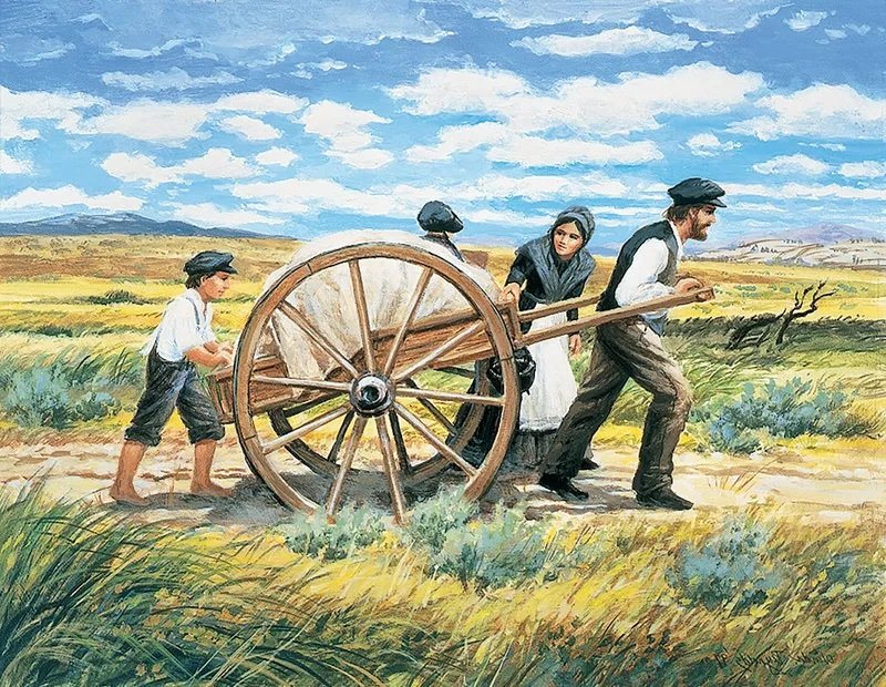 Pioneer family pushing and pulling a handcart